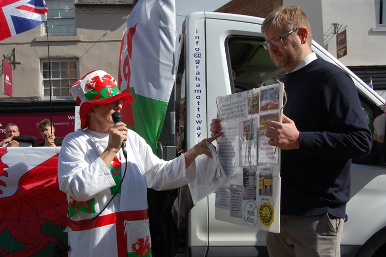 Dorothy Jackson addressing the crowd with Reform Councillor Karl Lewis. Photo: Cambrian News