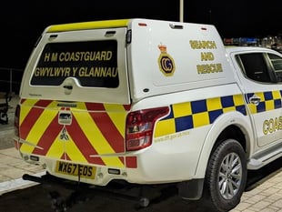 Dog walker rescued by coastguard