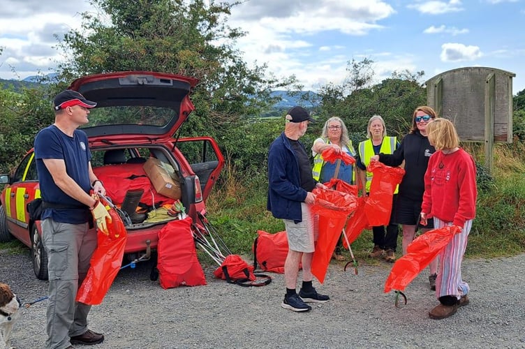 Some of Gwynedd's Keep Wales Tidy volunteers in action