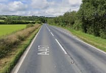 Woman dies following A487 collision with bus