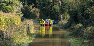 Fire crews rescue motorist stuck in floodwater 