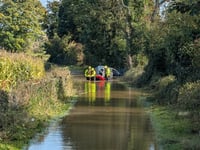 Fire crews rescue motorist stuck in floodwater 