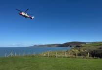 Woman airlifted after cliff fall