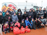 Pupils clean up beach despite bad weather