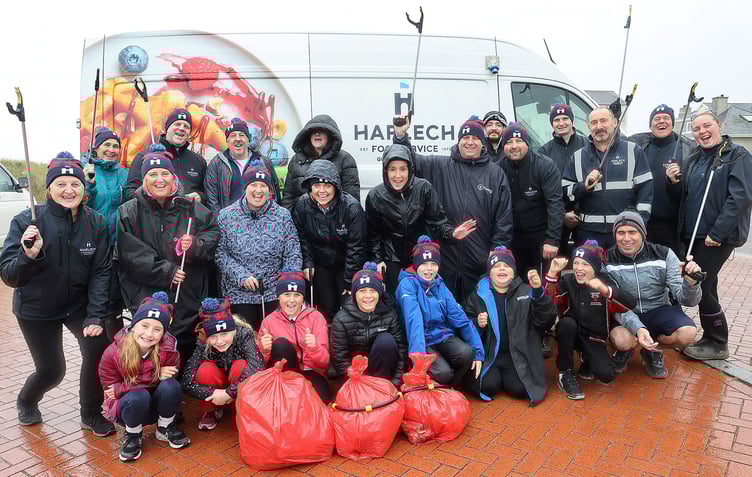 Staff from Harlech Foodservice,  members of South Caernarfonshire Soroptomists and children from Ysgol Cymerau. Photo: Phil Blagg Photography.