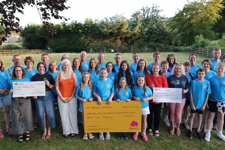 Criw Talgerreg with the cheques for the money raised for three charities