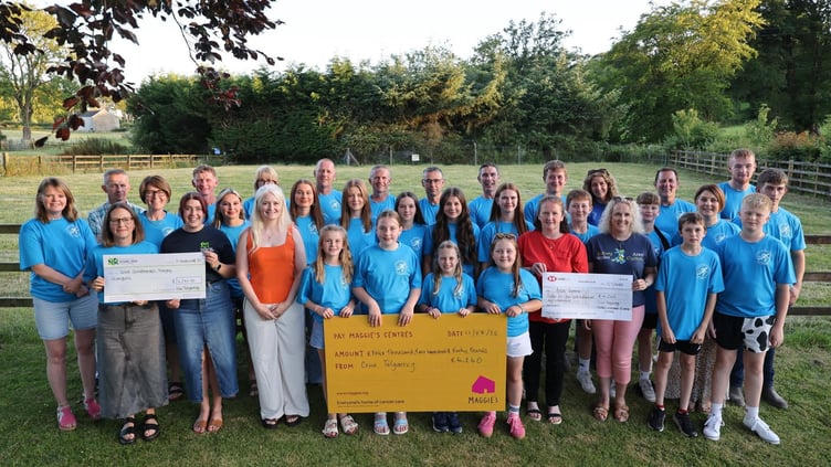 Criw Talgerreg with the cheques for the money raised for three charities