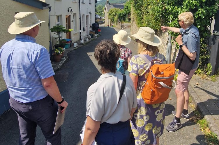 Chris Jones engaging with residents during a village walkabout