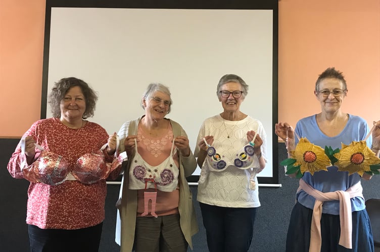 Members of HAHAV’s Textile group have been busy, making bra bunting ahead of the event. Photo: HAHAV