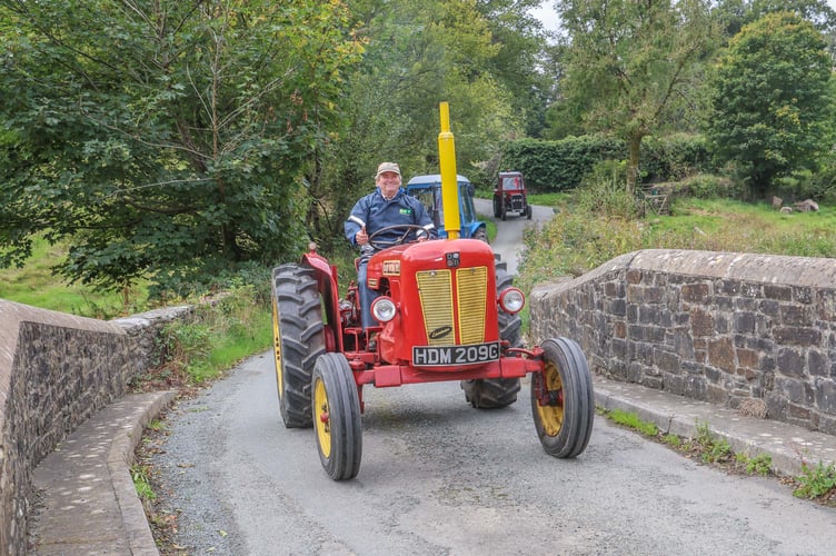 Wyn Vaughan heads over Lan Cych bridge on his David Brown