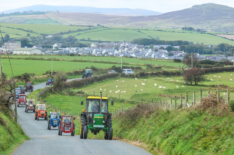 The convoy of tractors head out of Crymych up towards the Frenni