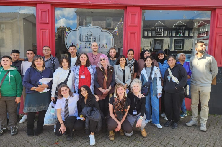 The Palestinian youth group meeting Machynlleth young people and enjoying lamb cawl at the Machynlleth Community Hub. Photo: DVPS/ CADFA
