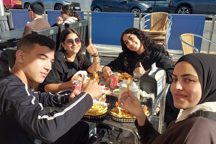 Enjoying fish and chips on Aberystwyth promenade. Photo: DVPS/ CADFA