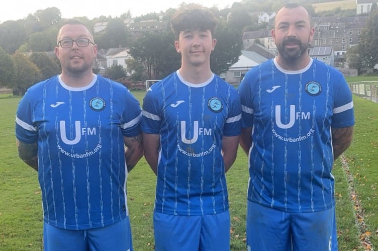 Ethan Summerfield with his dad, Damian, and uncle, Dean, in Llandysul colours