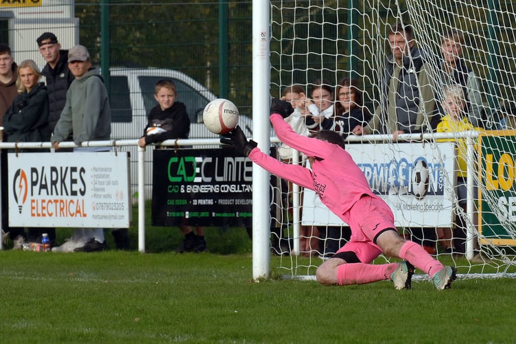 Dolgellau keeper Darren Edwards in action