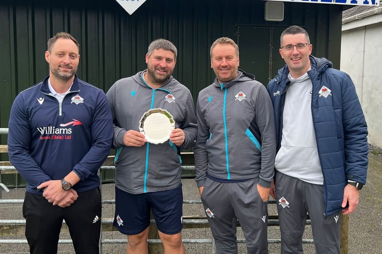 Llanuwchllyn's Siôn Tudor(left) was presented with the Ardal League North East manager of the month award on Saturday. He thanked his management team for the club's strong start to the season (Photo: Gareth Charles)