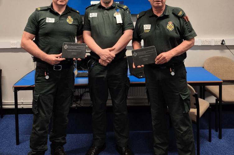 Pictured with Ben Walters, volunteering support officer from Welsh Ambulance Service (centre) are Community First Responders Sion (left) and Wyn (right). Photo: Welsh Ambulance Service