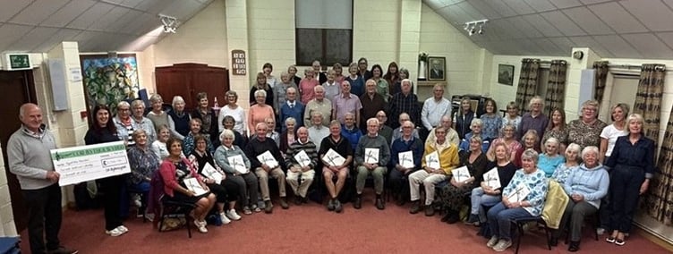 Pictured above: Côr Bytholwyrdd with Paige Denyer, Fundraising Support Officer for Hywel Dda Health Charities.