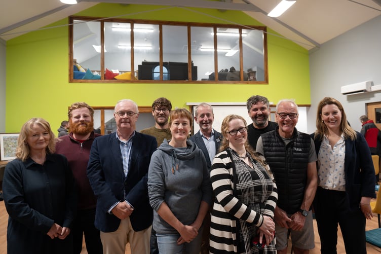 Members of Gwynedd Council,the Original Roofing Company, Antur Stiniog, JW Greaves, Llechi Cymru and the UK Government at Yr Aelwyd. Photo: Gwynedd Council