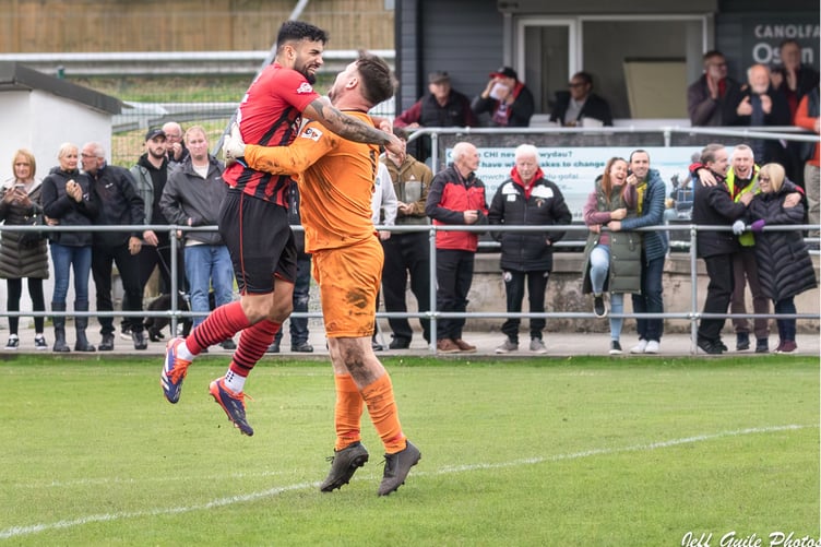 Celebrations after Porthmadog beat Buckley in a penalty shoot-out (Photo: Jeff Guile)