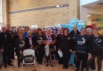 Tenovus choir raises money singing for shoppers