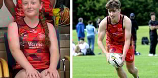 Silver medal touch rugby medals for Medi and Osian