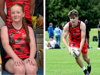 Silver medal touch rugby medals for Medi and Osian