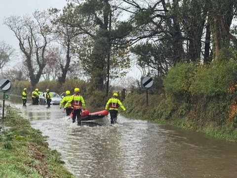 Warning to drivers after two rescued from floodwater