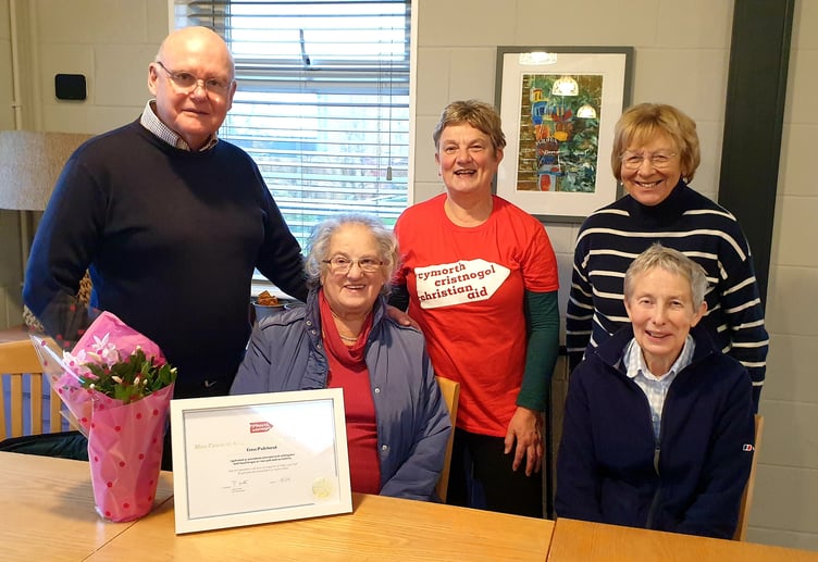 Lena Pritchard was presented with her award by Llinos Roberts, Engagement and Fundraising Officer for Christian Aid Church, Rev Bryn Williams, Treasurer Daphne Jones, Treasurer and Valerie Williams, the Pwllheli branch’s new organiser
