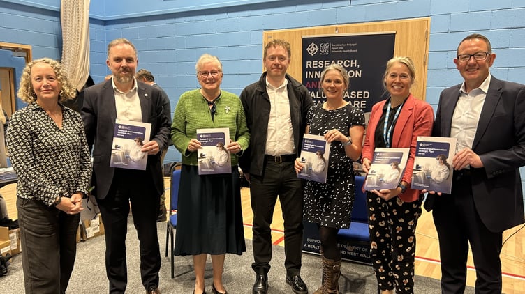 From left, Sally Hore Head of Research and Development; Professor Leighton Phillips, Director of Research, Innovation and Value; Professor Sue Denman, Dr Will Macintosh, Dr Anna Collenette, Professor Helen Munro and Hywel Dda's Medical Director, Mr Mark Henwood