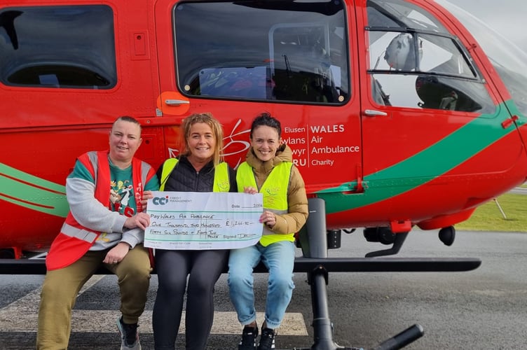 Heulwen with friends Katie and Nyfain during their visit the the charity's Caernarfon air base