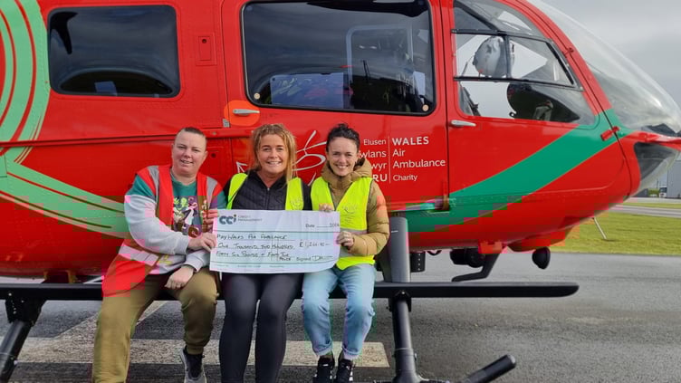 Heulwen with friends Katie and Nyfain during their visit the the charity's Caernarfon air base