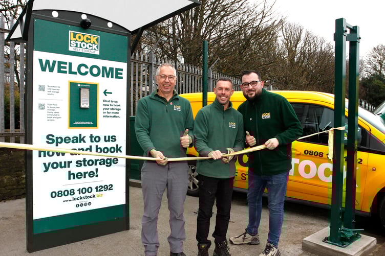 Lock Stock’s Rob Jones, left, and Commercial Manager Ollie Beech watch as West Wales Regional Manager Lee Hanson cuts the ribbon on their new Aberystwyth site. Photo: Phill Davies.