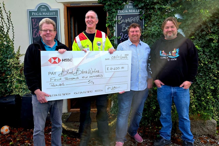 Pwllheli’s Peg and Mallet pub was the location for a cheque presentation to Blood Bikes Wales
