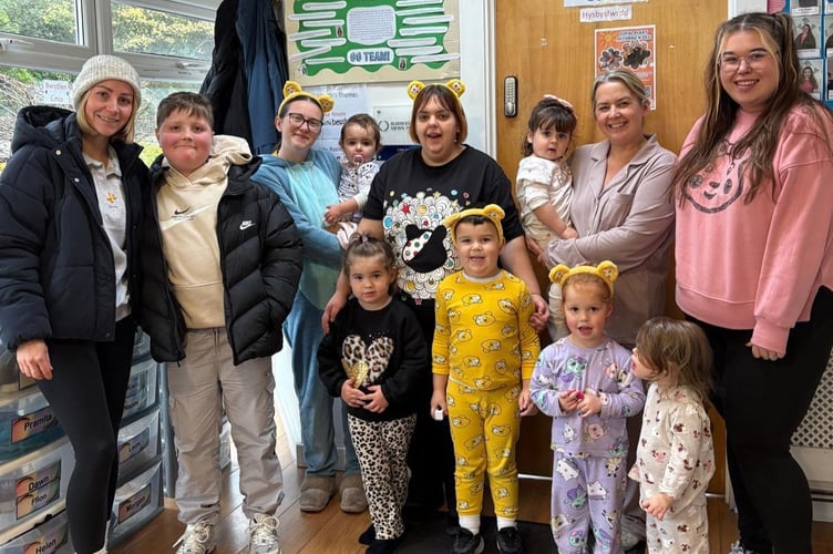 Rufus (left) with his mum Rosie and some little angels at the Little Angels Nursery during their Children In Need fundraising day. Photo: Rosie Palmer