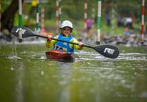 Young kayaker's skill captivates social media