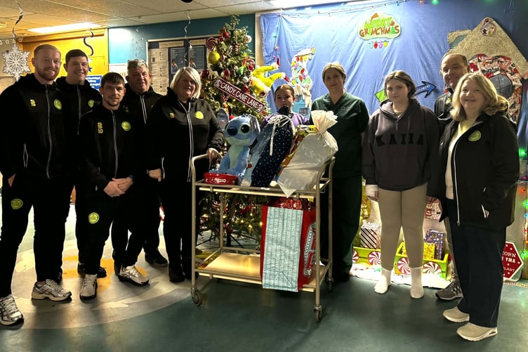 The Caernarfon Town representatives at the children's ward