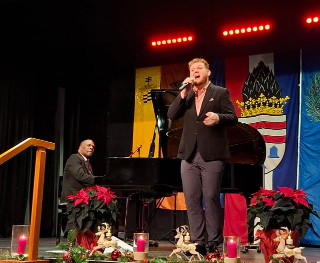 Mo Pleasure represents Aberystwyth at twin town's Christmas market