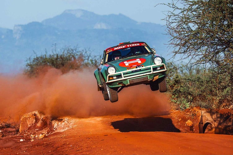 Steve McPhee and Harry Hunt take off on the Kenyan roads in their Porsche 911
