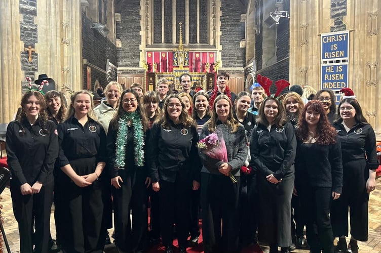 Holy Trinity Church in Aberystwyth was filled with festive spirit when Aberystwyth University Wind Band joined forces with the Elizabethan Madrigal Singers
