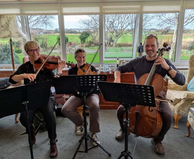 Totaleigh Music Trio brings Christmas cheer to Tywyn care homes