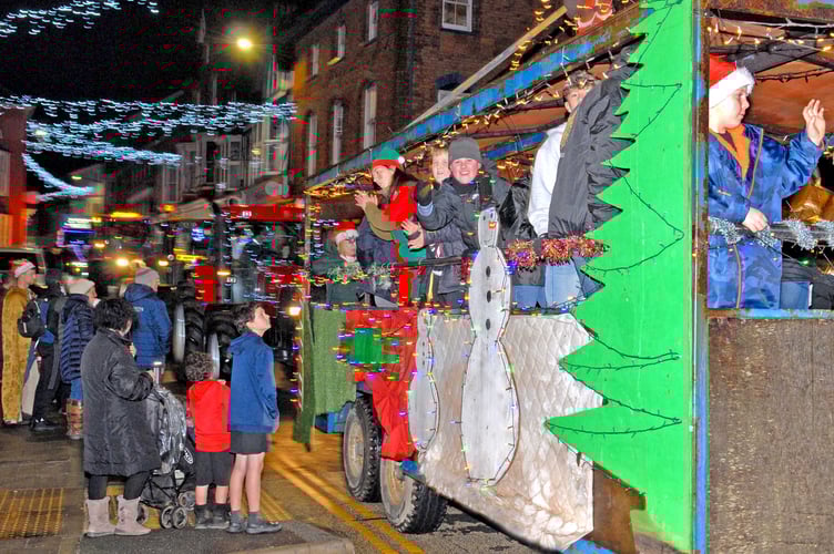The parade included YFC members on their festive trailer singing Christmas songs and carols