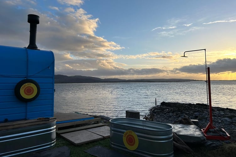 Two plunge pools and a shower overlooks the Dyfi estuary at the new Sawna Dyfi site.