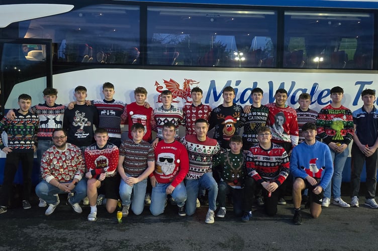 Aber in their Christmas jumpers