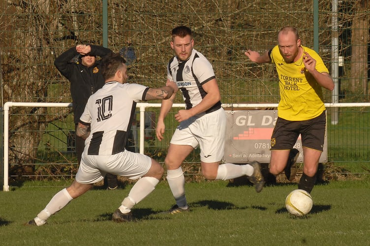 Paul Lewis (right) scored Dolgellau Reserves' winning penalty (Photo: Rod Davies)