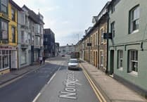 Man arrested after woman hit by car in Aberystwyth town centre