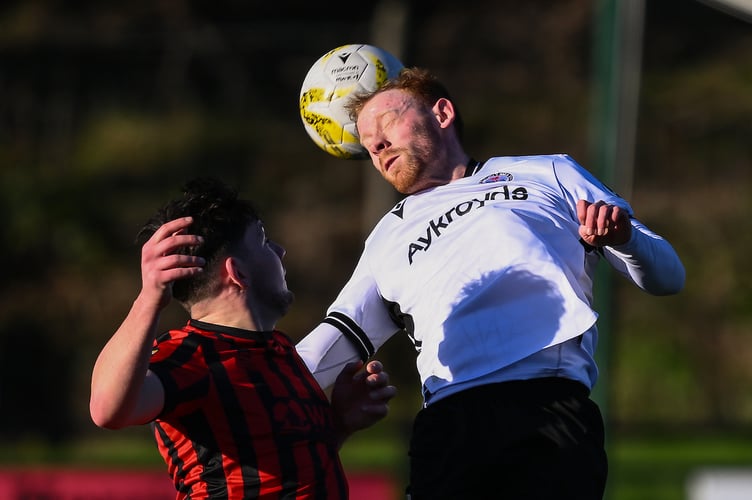 BALA, WALES - 31 December 2025: Sam Billington of Bala Town wins the header during the JD Cymru Premier between Bala Town and Caernarfon Town at the Maes Tegid in Bala. (Pic by Craig Thomas/FAW)