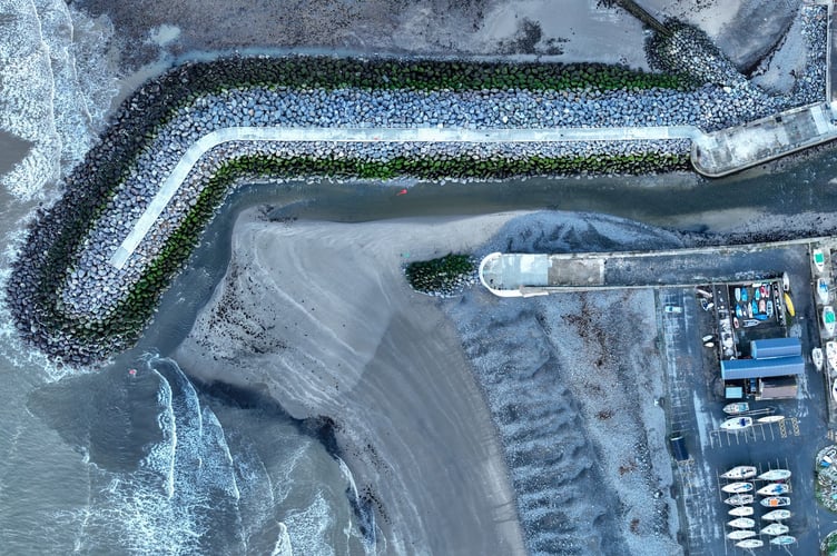 The new breakwater was one of the new flood defences, along with new timber groynes, rock revetment reconstruction and glass walls along the harbour.