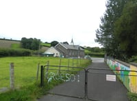 Under-threat village school praised by inspectors