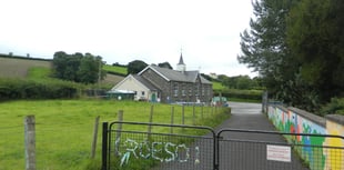 Under-threat village school praised by inspectors